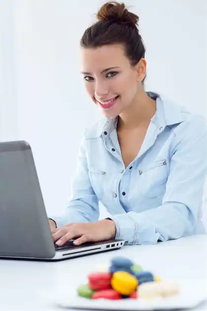 SEO Manager Larissa Neumann Using Laptop